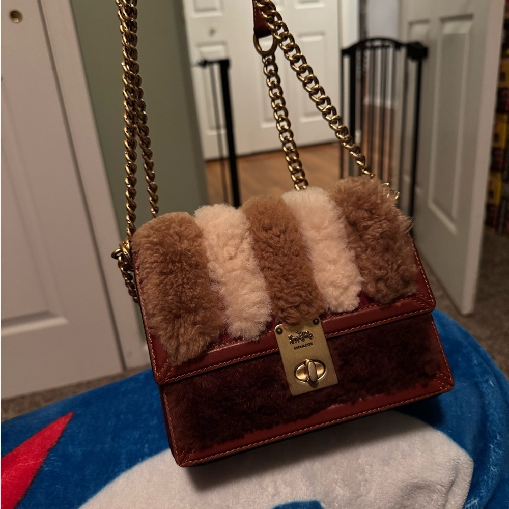 Gently used fur Coach bag